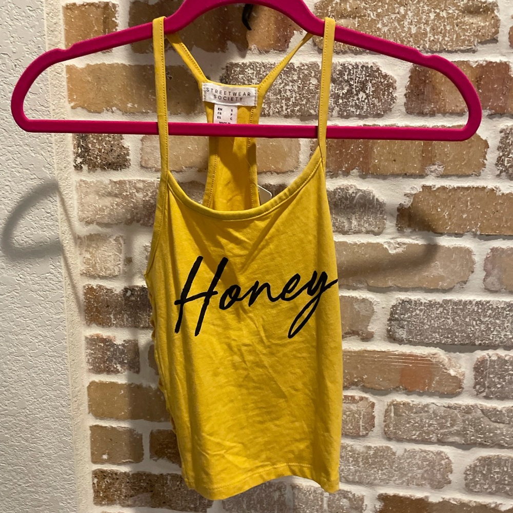 Yellow shirt with open sides